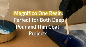Pouring Magnifico One Resin into a wooden mold and spreading resin on a blue art piece with a wooden stick