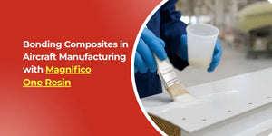 Person in blue gloves applying resin with a brush on aircraft composite part for manufacturing