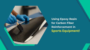 Worker applying epoxy resin with brush on carbon fiber material for sports equipment reinforcement