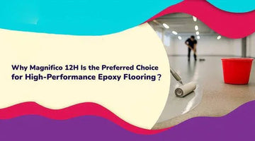 Person applying high-performance epoxy flooring with roller and red bucket in bright industrial space